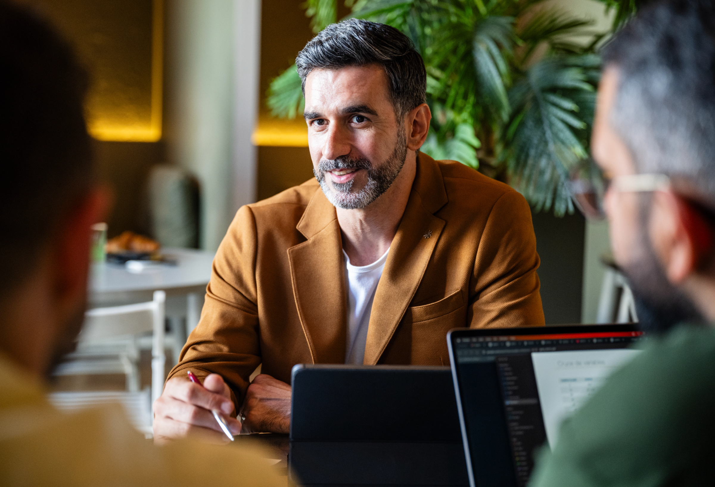 people discussing around a table