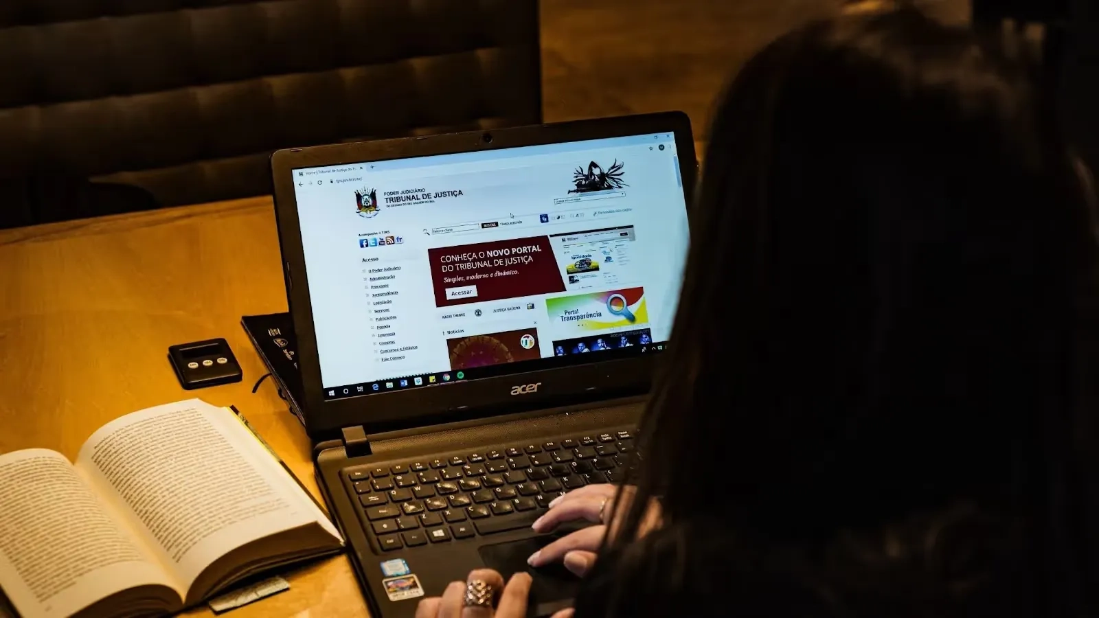 person sitting in front of a laptop