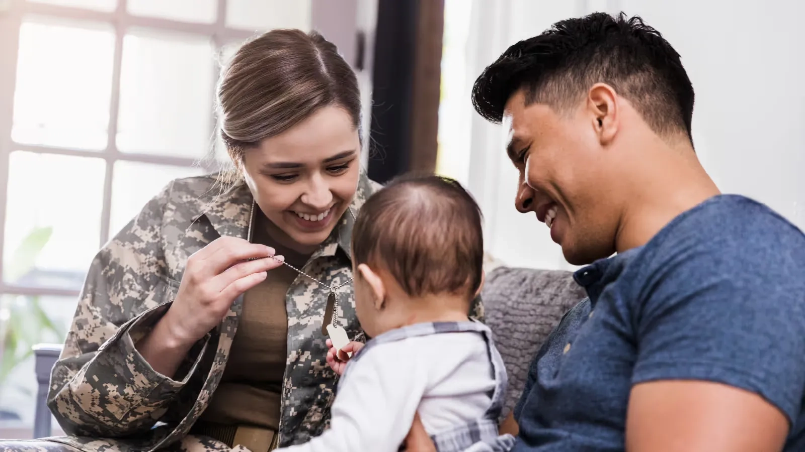 family with military spouse enjoying moment together
