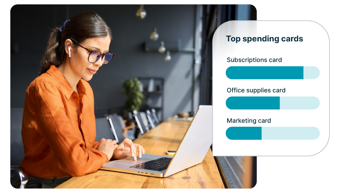 A person looks at a graph of her top spending cards