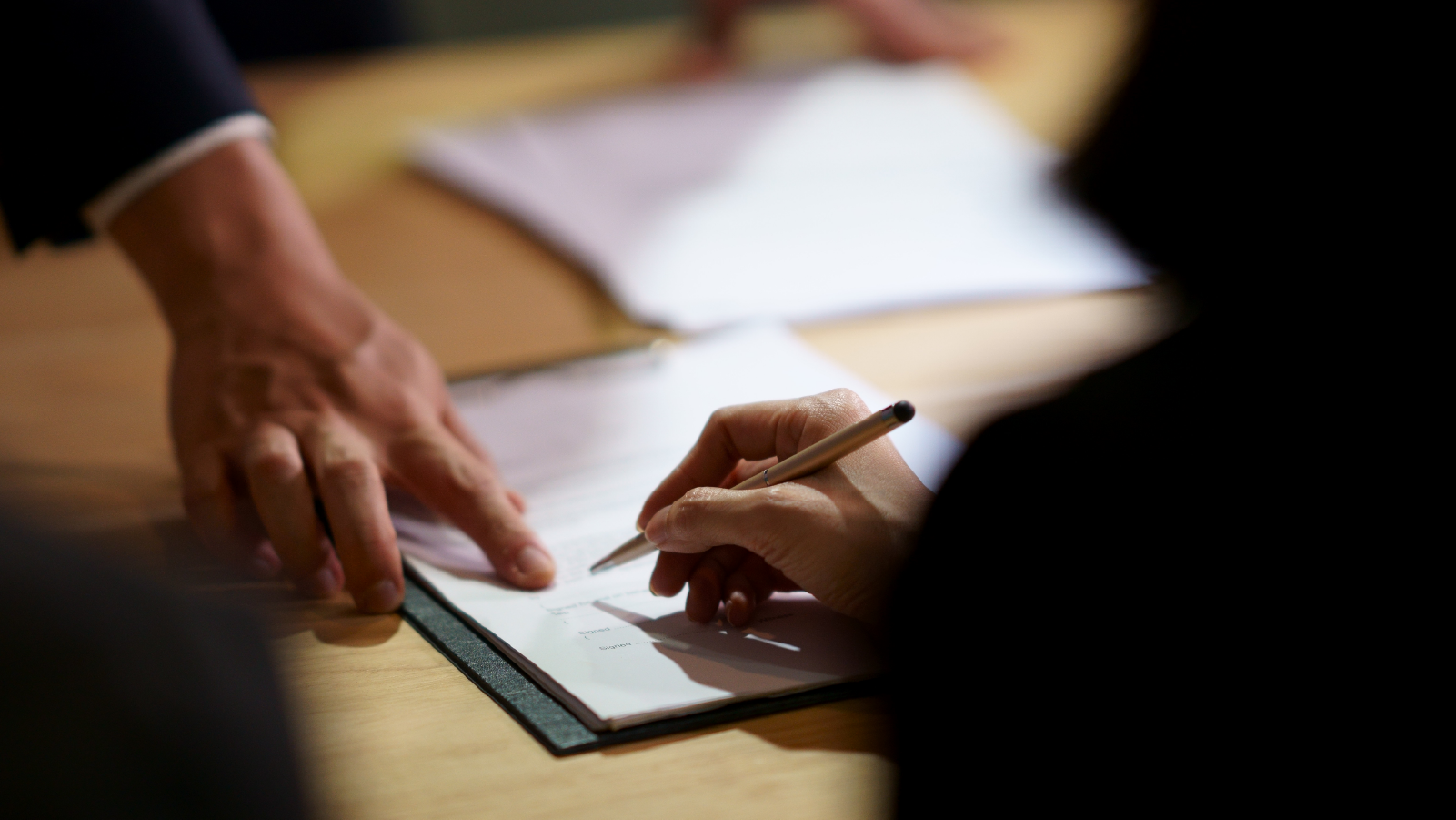 Immigration lawyer filling out form I-589