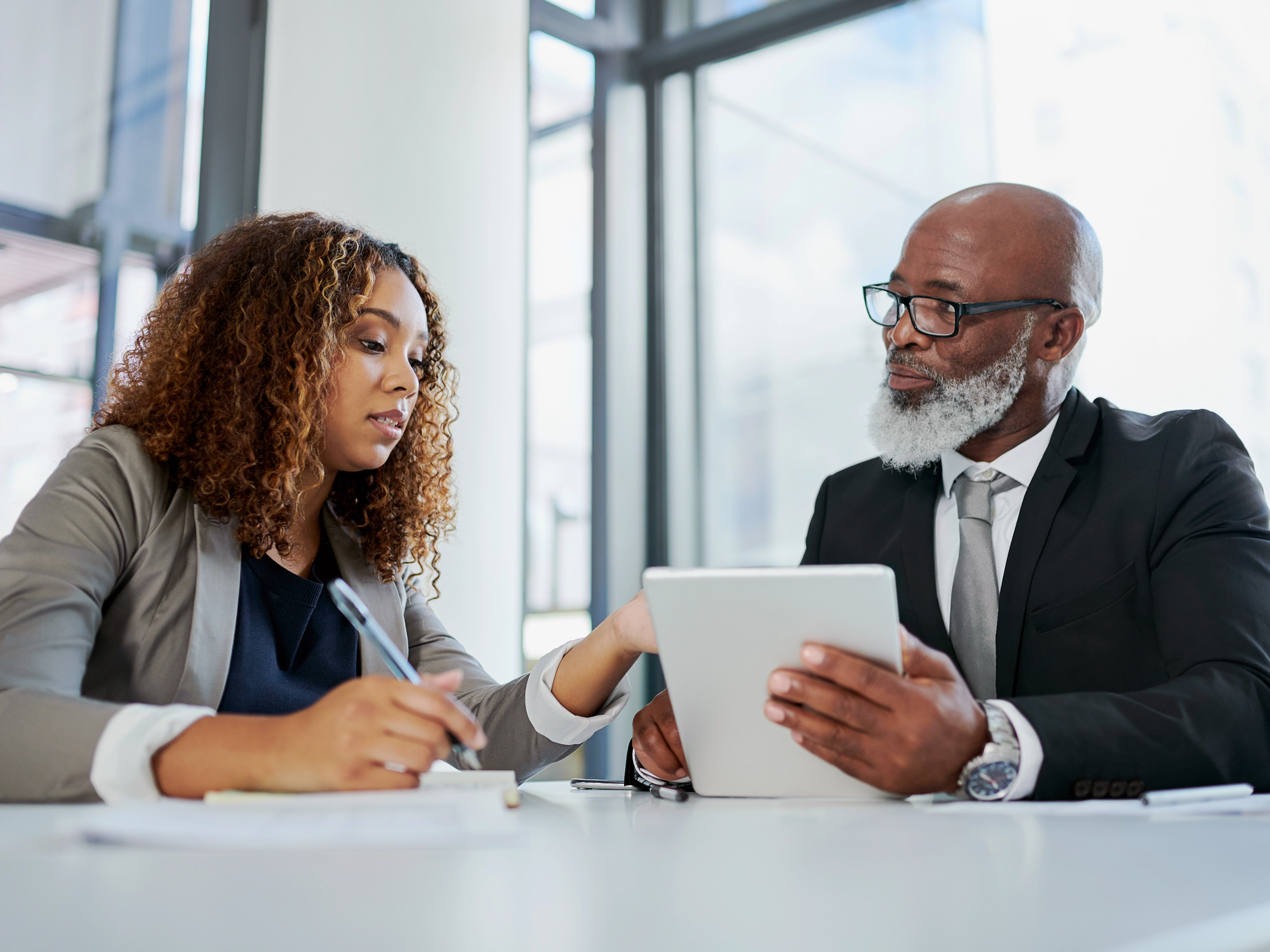 Lawyer interviewing clients in their office