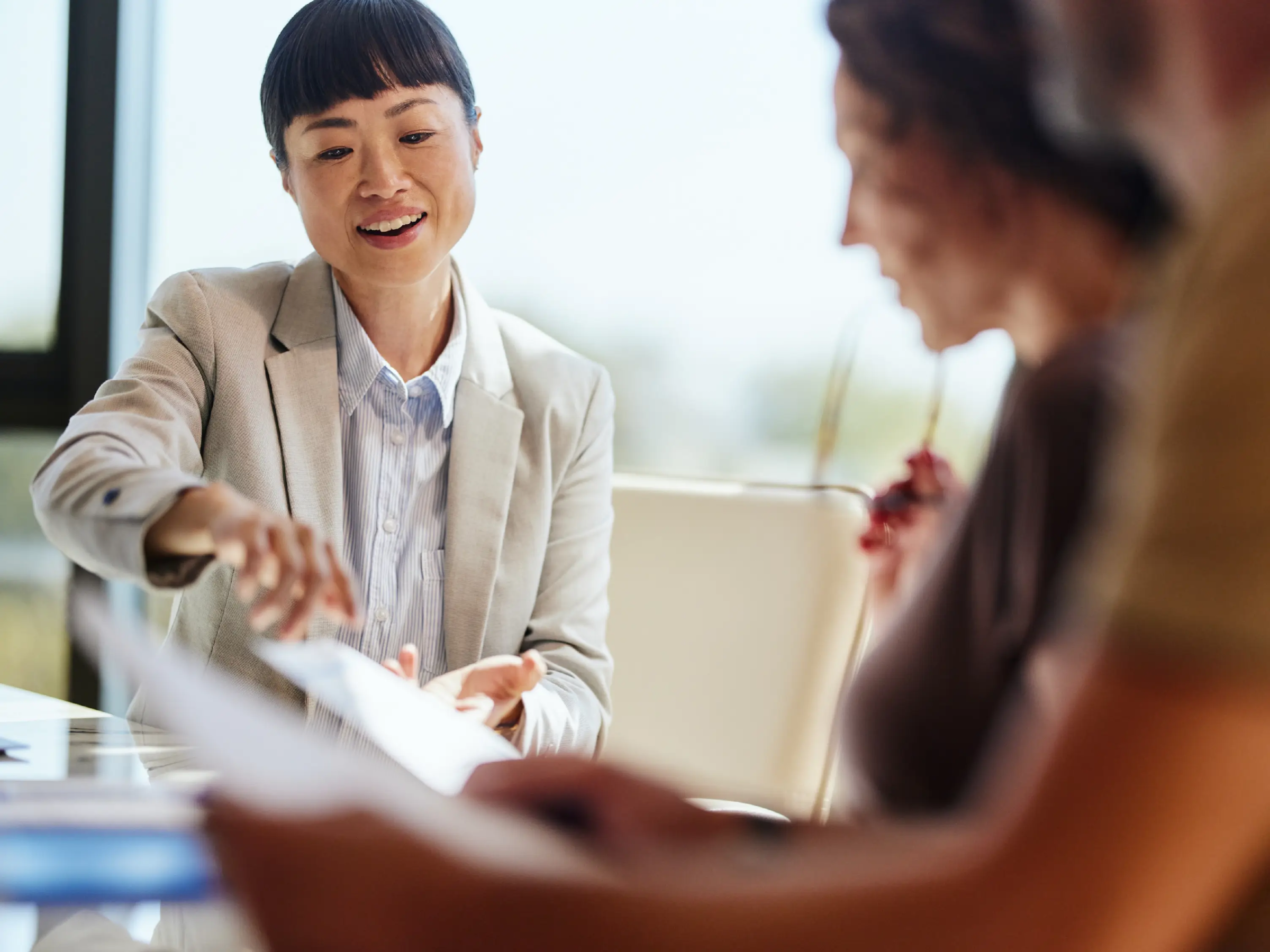Lawyer meeting with a group of clients to begin the intake interview