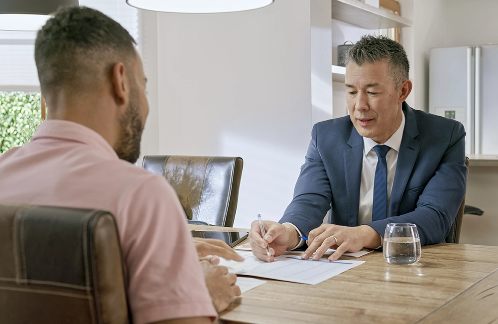 Lawyer working with client in their office