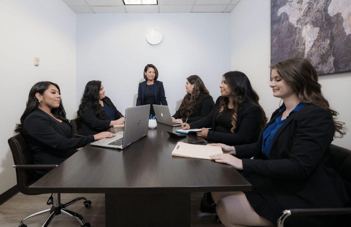 Lawyers meeting in board room
