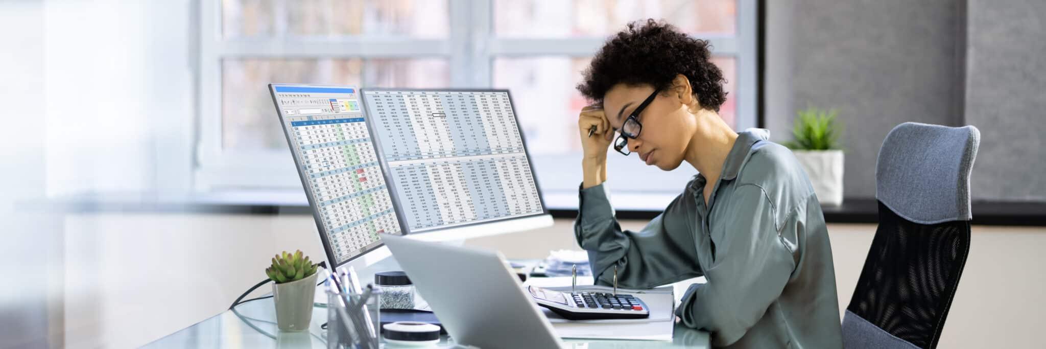 Person frustrated by spreadsheets