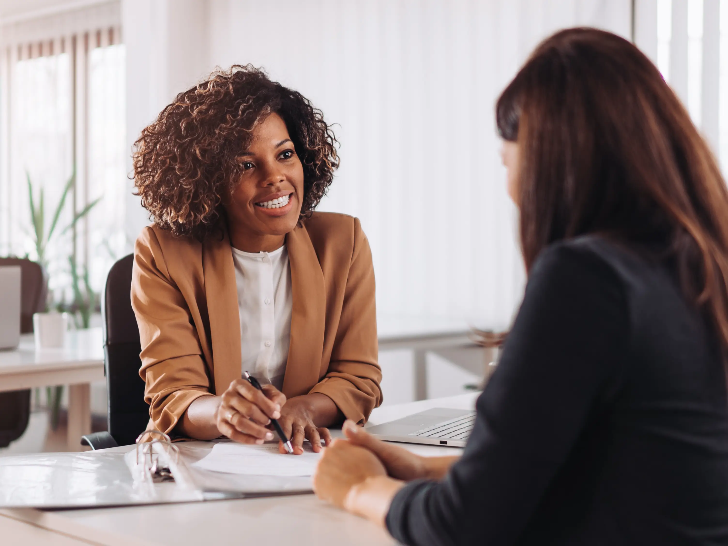 Lawyer meeting a client in their office