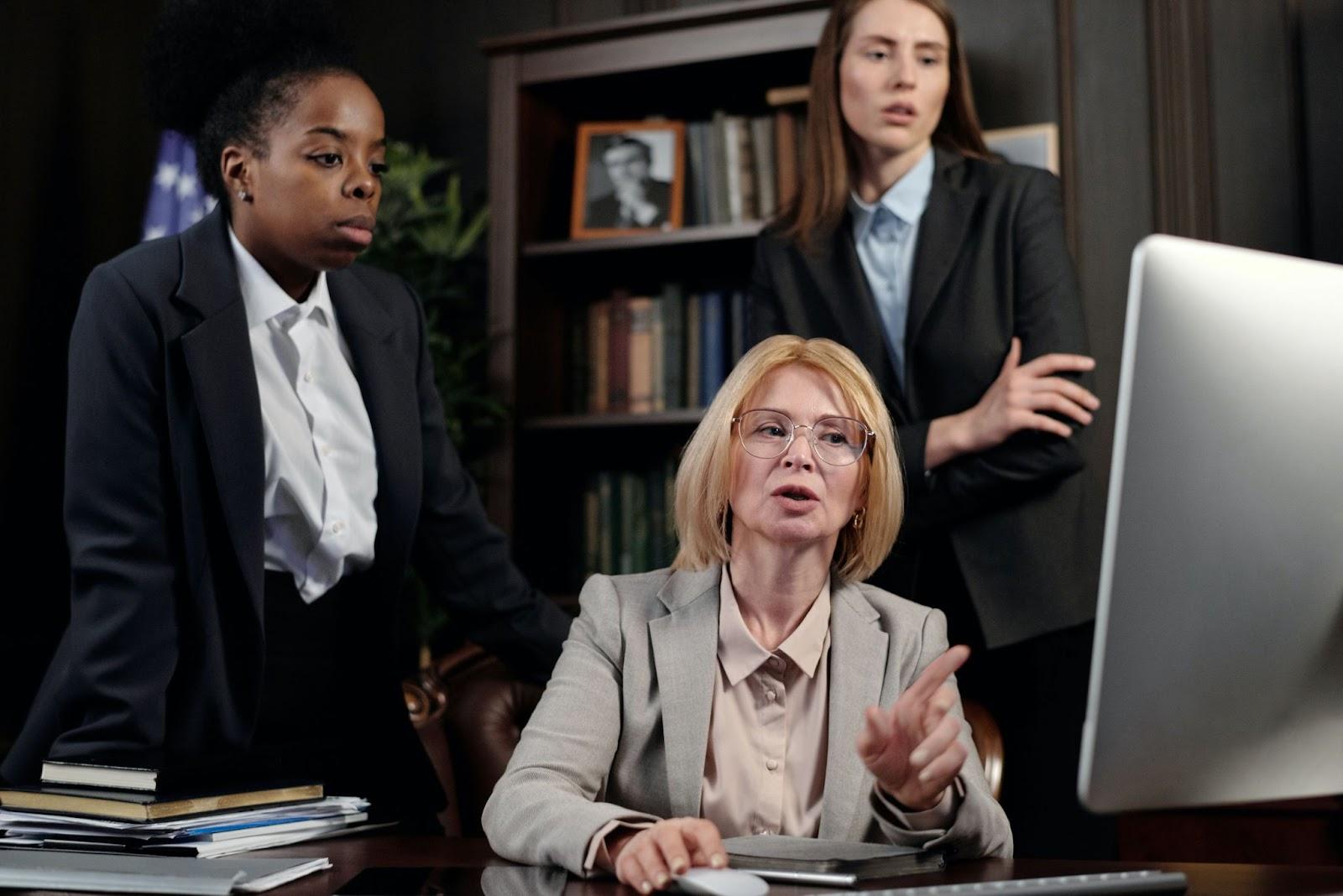 immigration lawyers reviewing their legal software to discover information