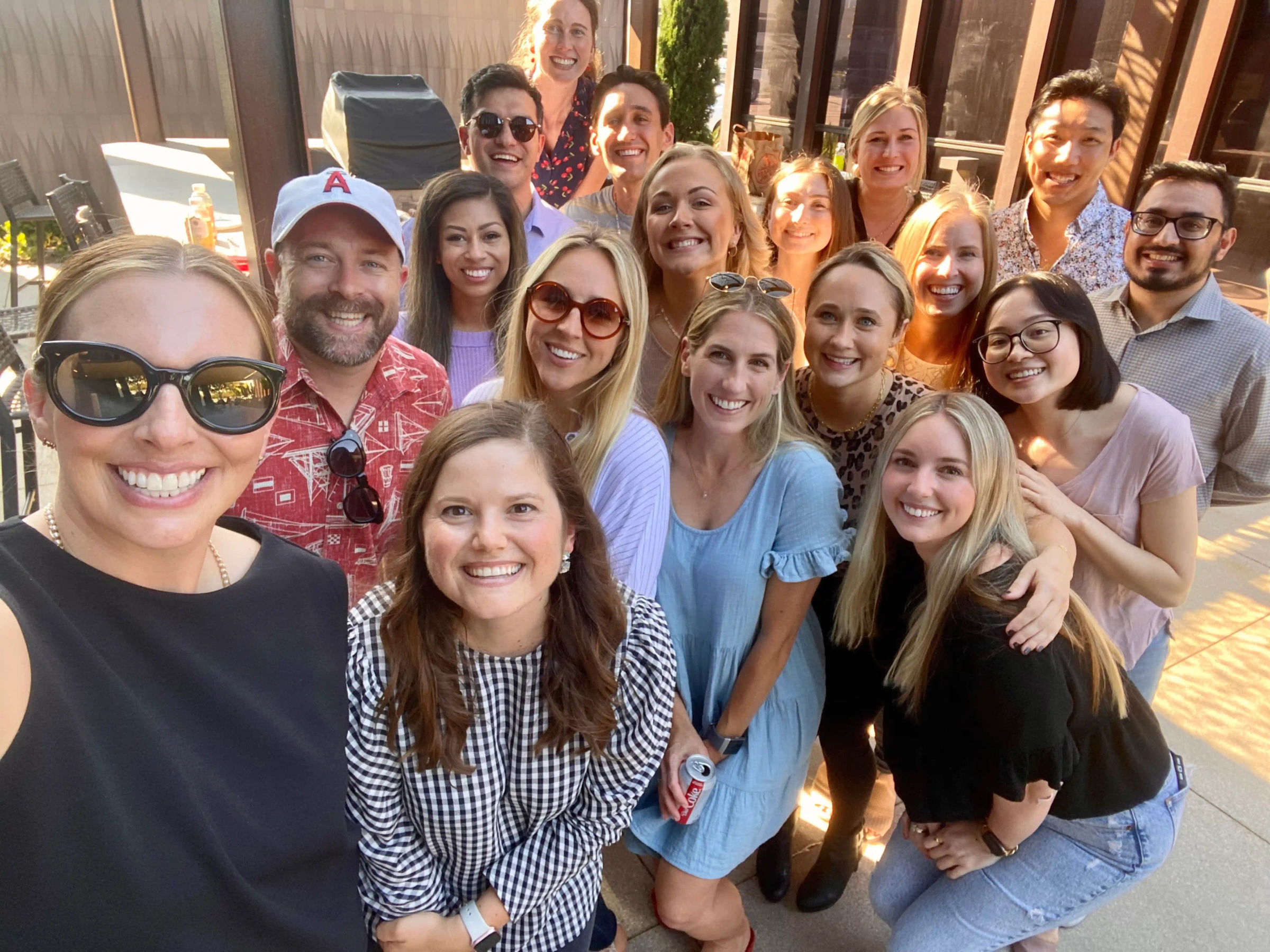 CASEpeer Employees Smiling In A Group Photo 