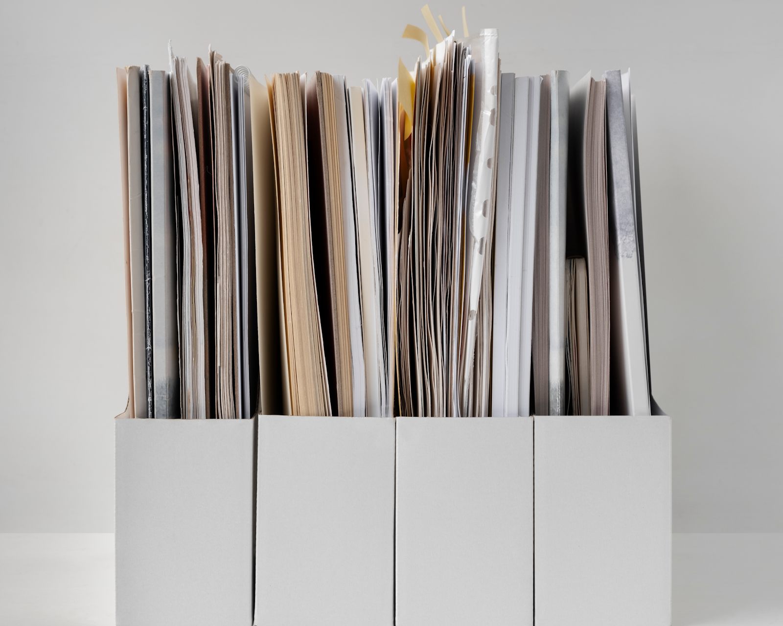 documents organized in folder bins