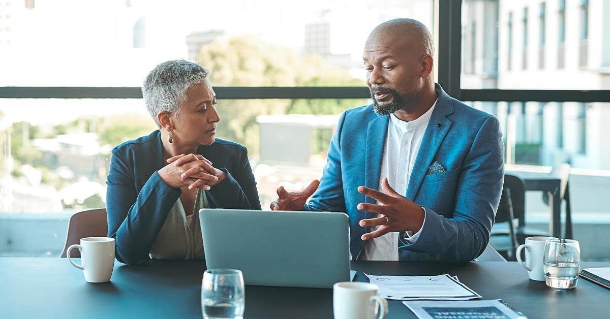 Lawyer talking with other people on their staff