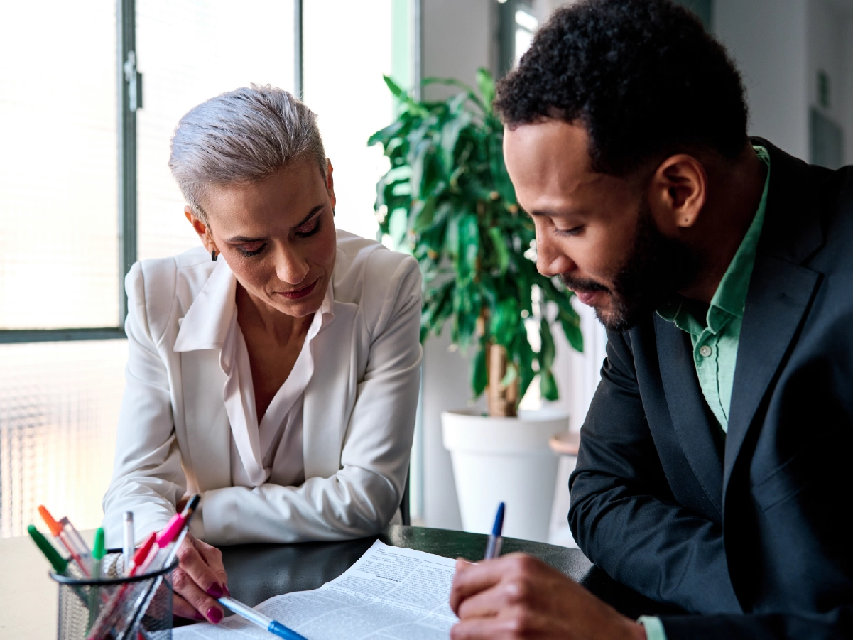 Lawyers reviewing a business plan