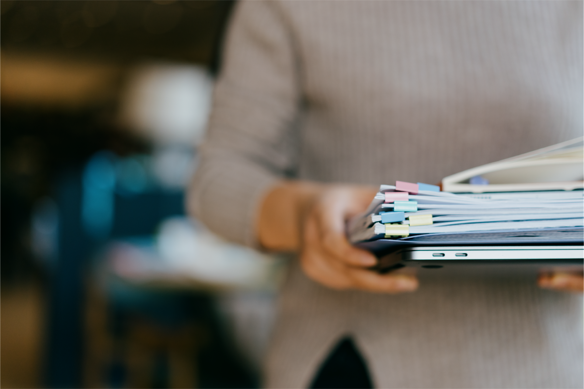person holding files