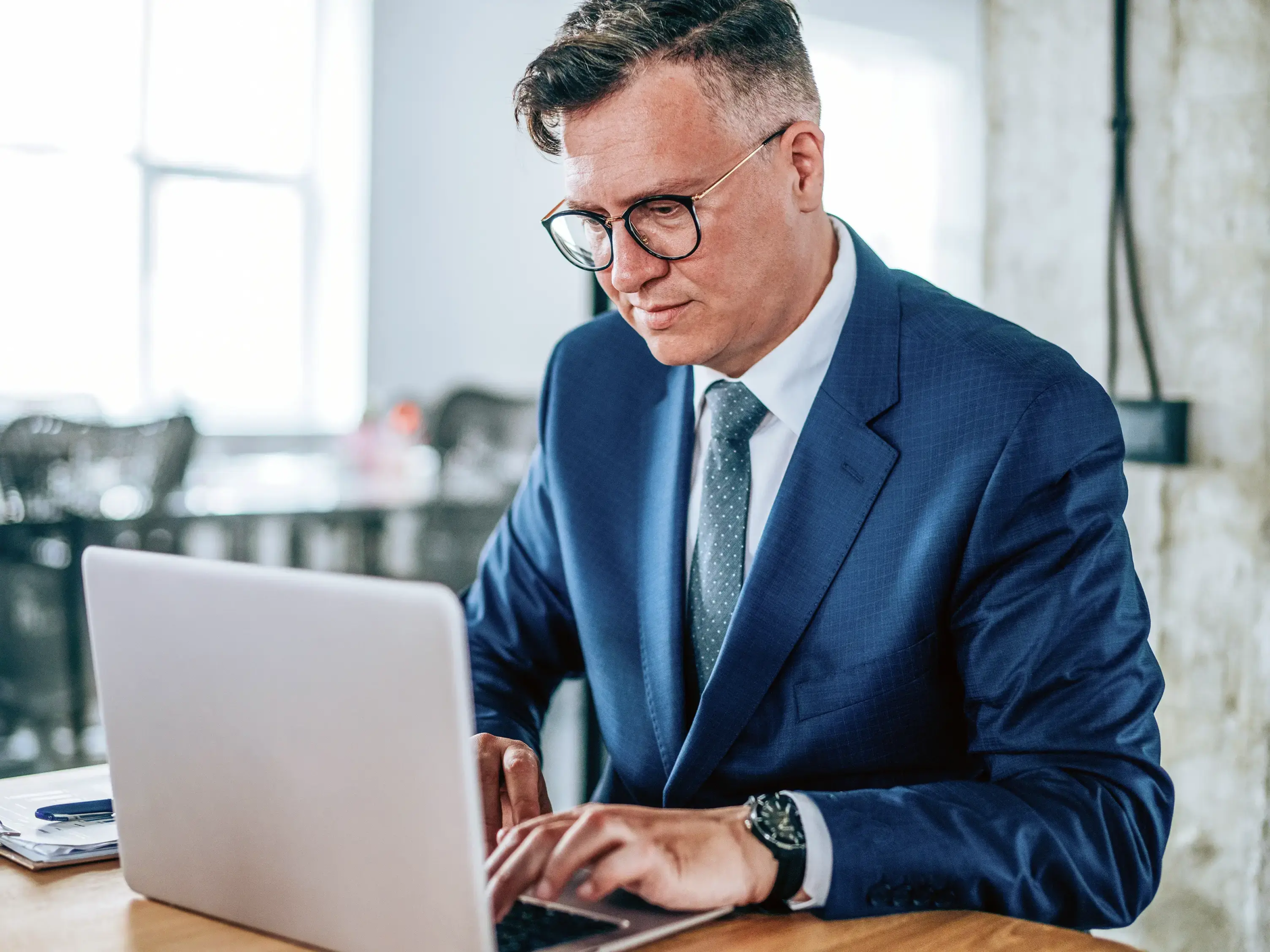 Lawyer reviewing invoices on their laptop