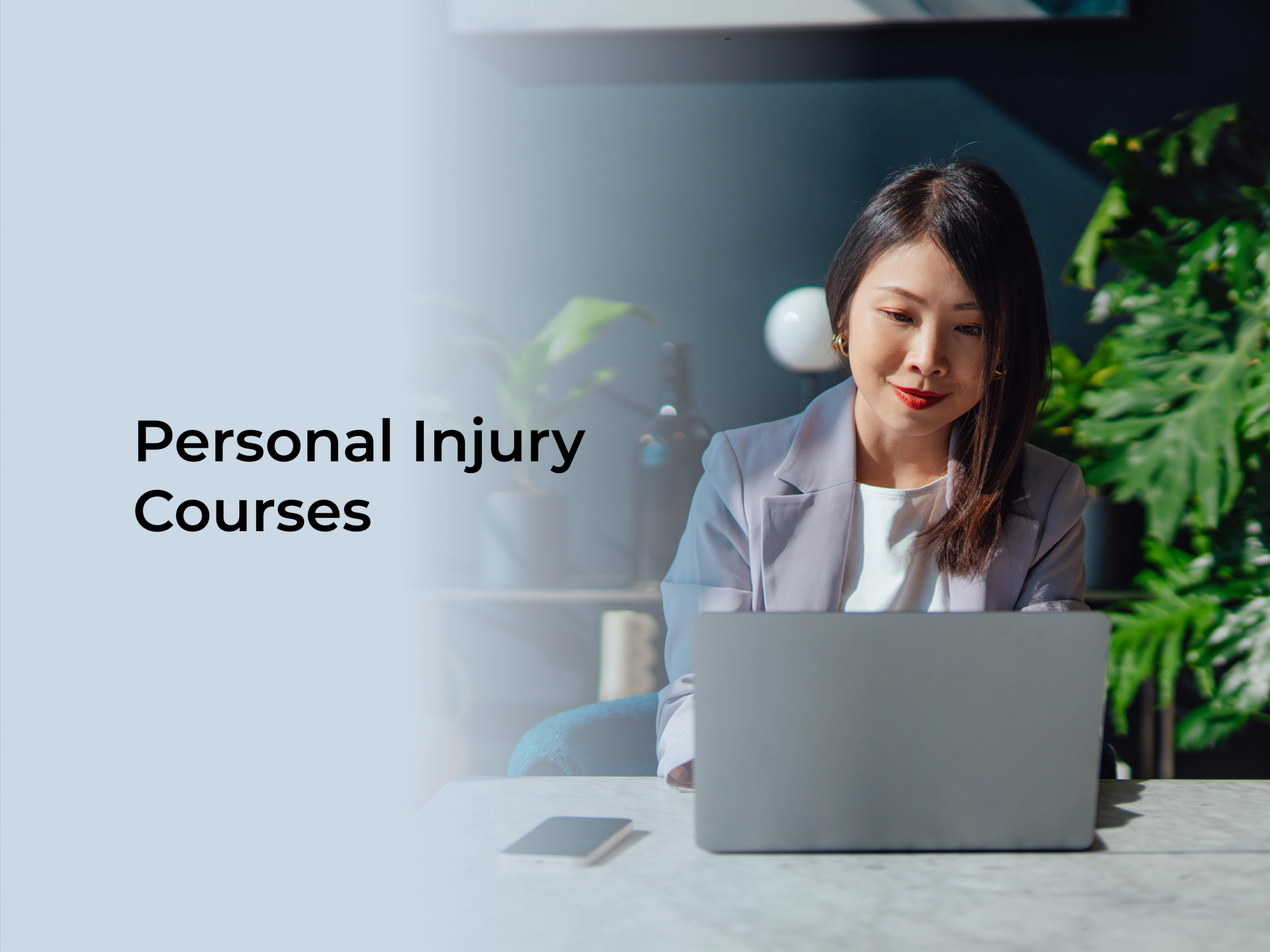 Lawyer sitting at table with laptop