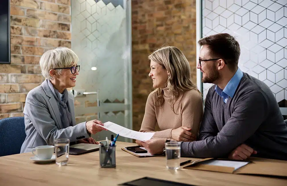 Coworkers collaborating in office space