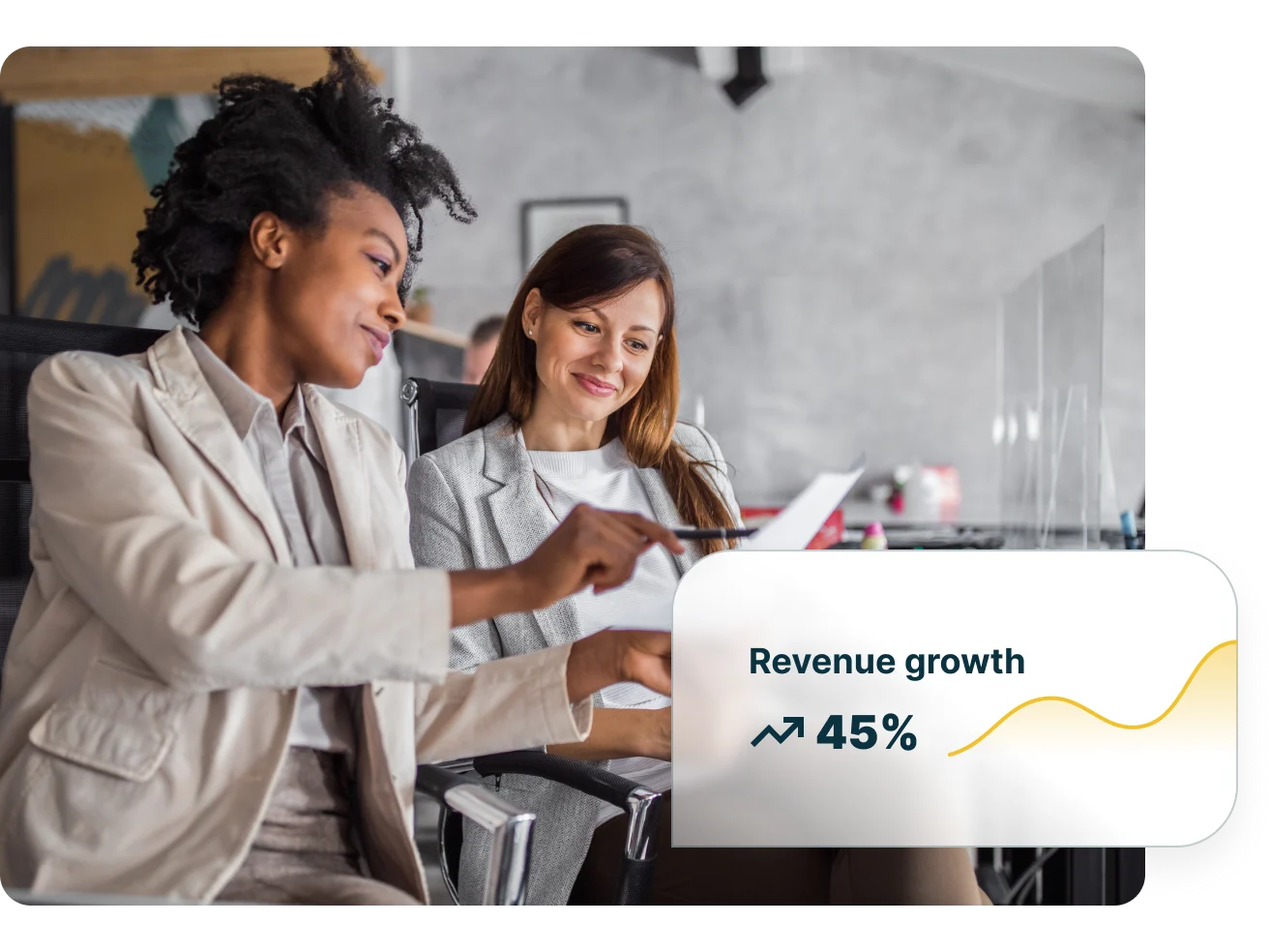 Two people talking and image of revenue growth