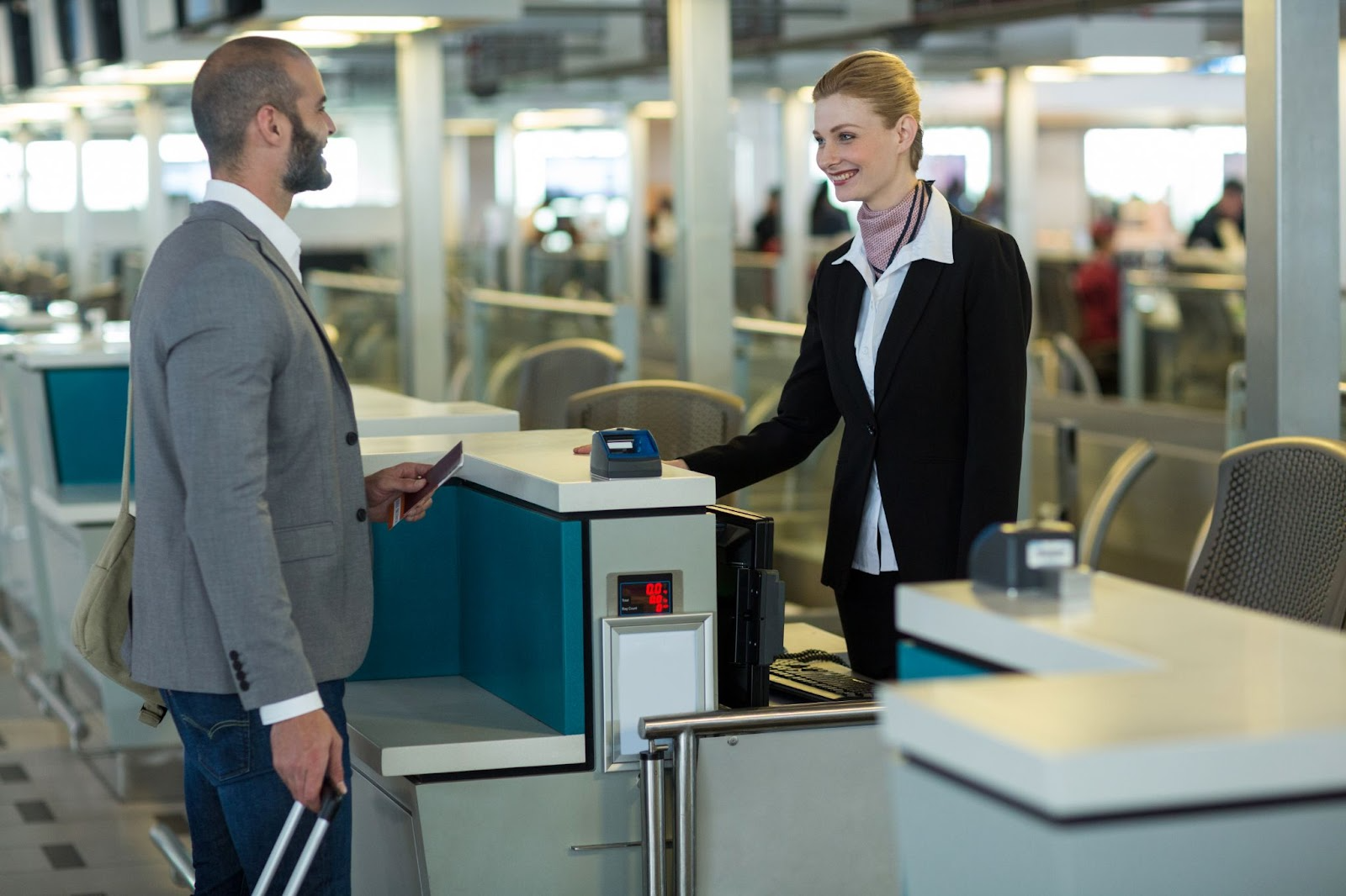 traveler as the airport taking his airplane ticket