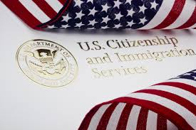 US Citizenship and Immigration Services logo: a blue and white emblem featuring a bald eagle and the words "USCIS" and "Department of Homeland Security."