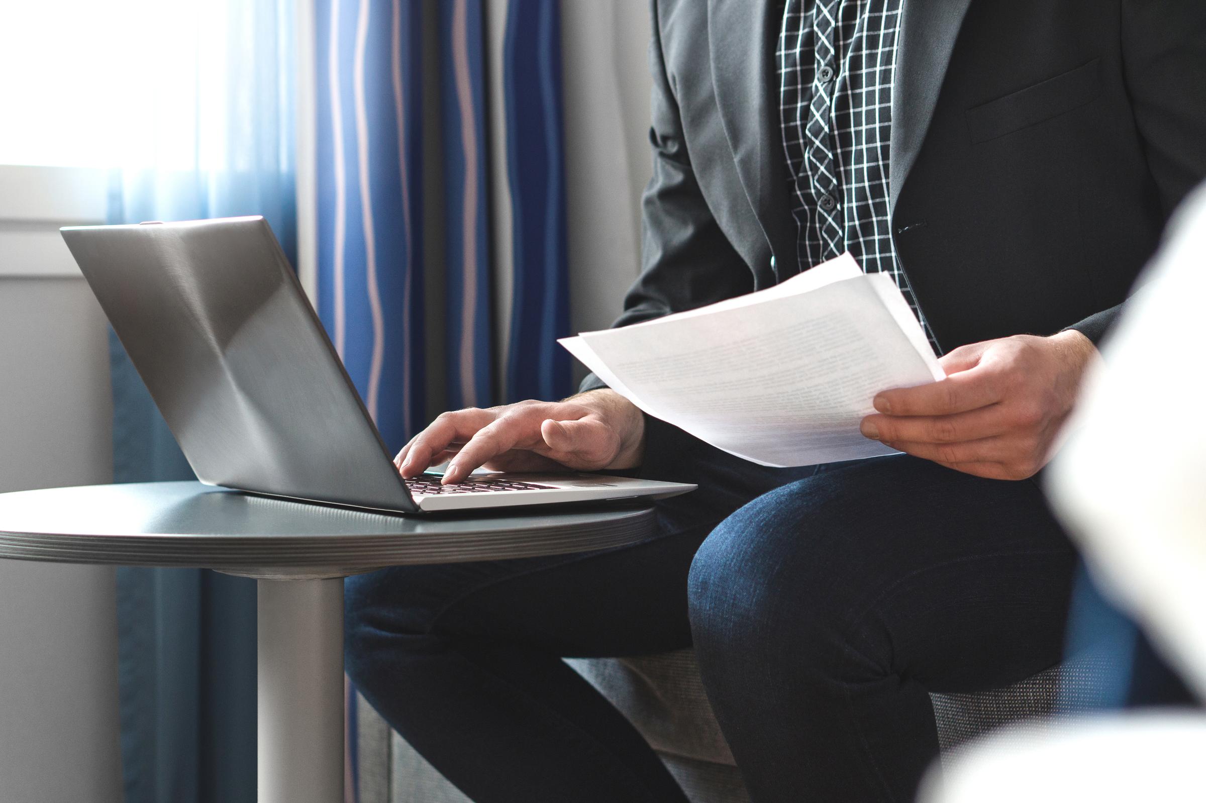 Person studying documents