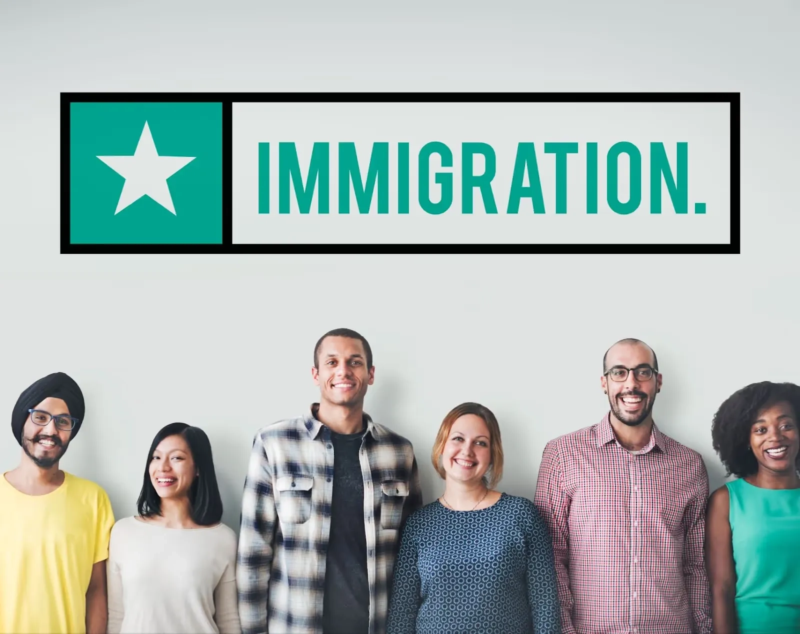 people smiling around a sign with the word immigration