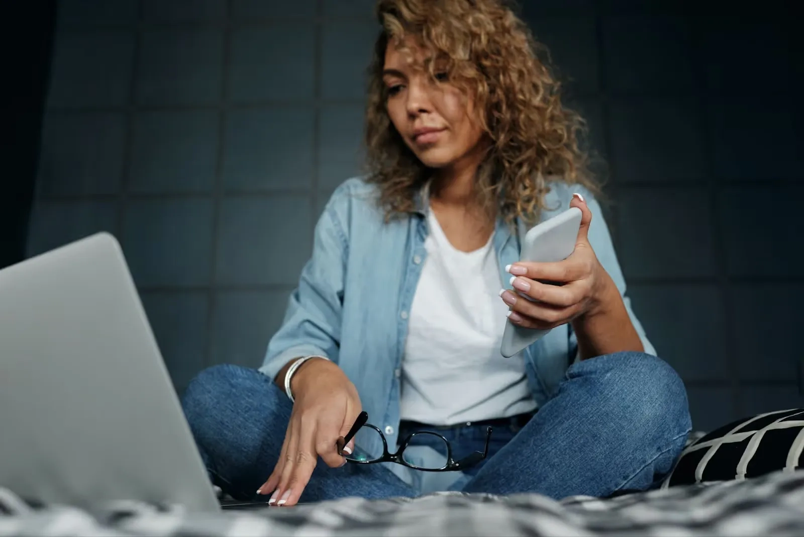 person reviewing information on laptop