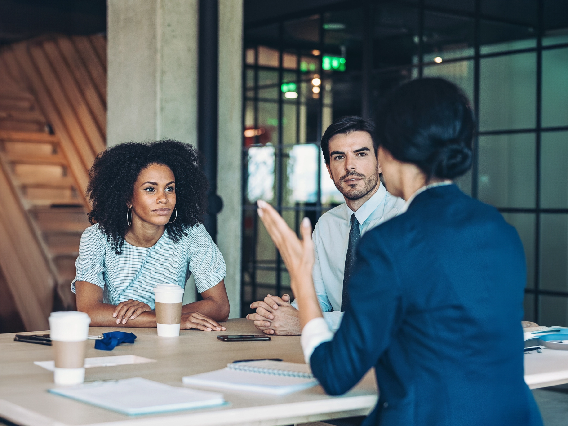 Small law firm staff meeting to discuss their marketing strategy