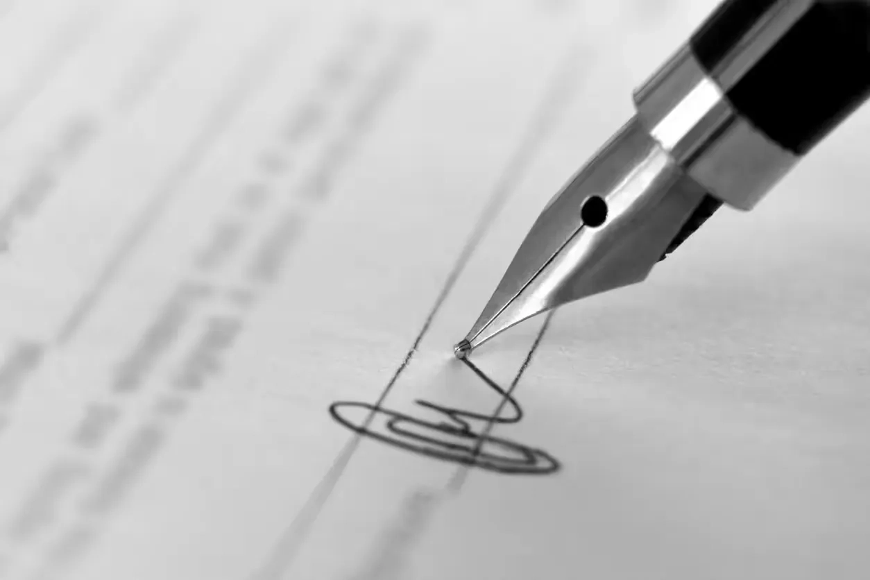 signing on the dotted line