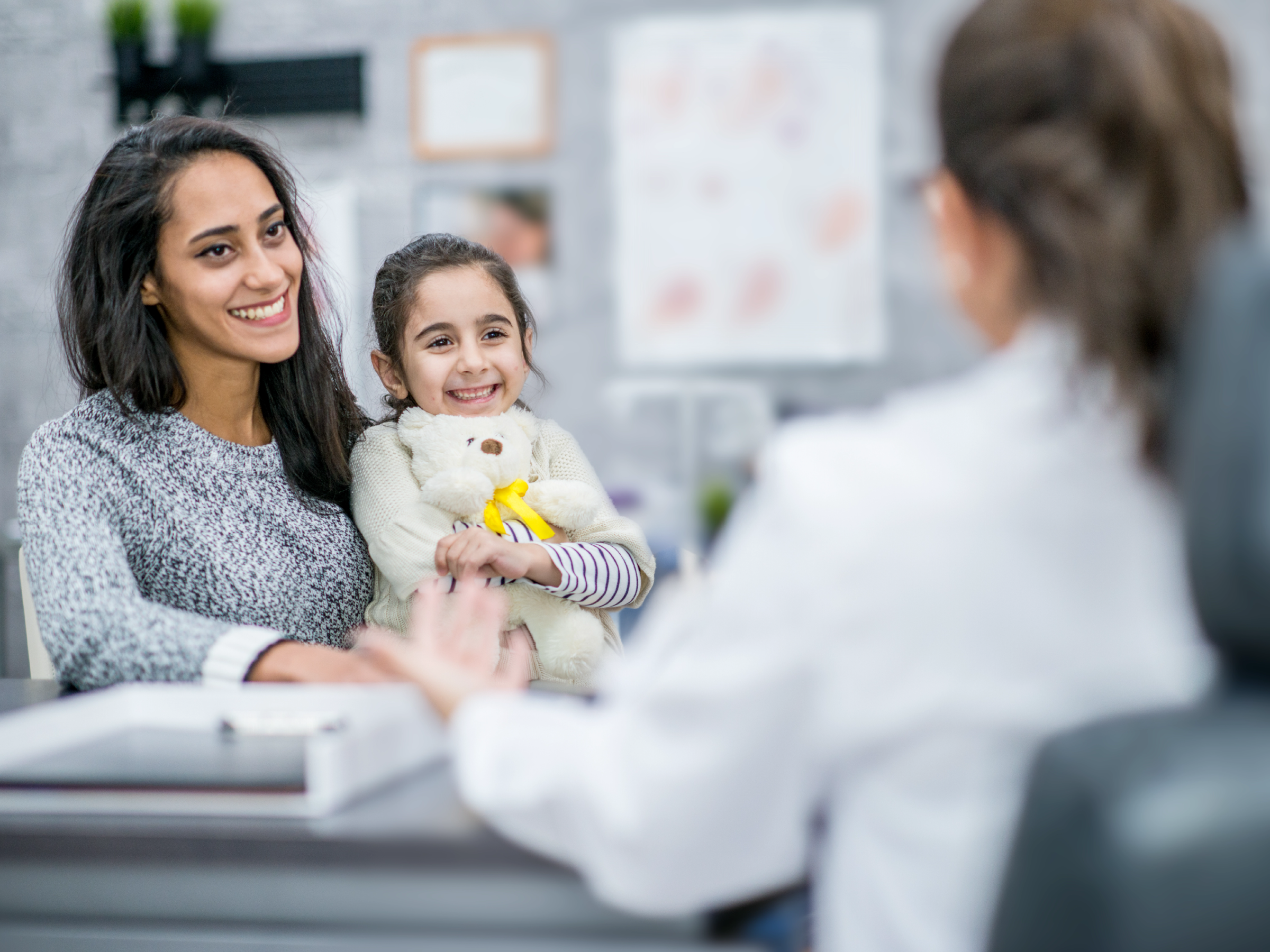 Woman speaking to immigration lawyer