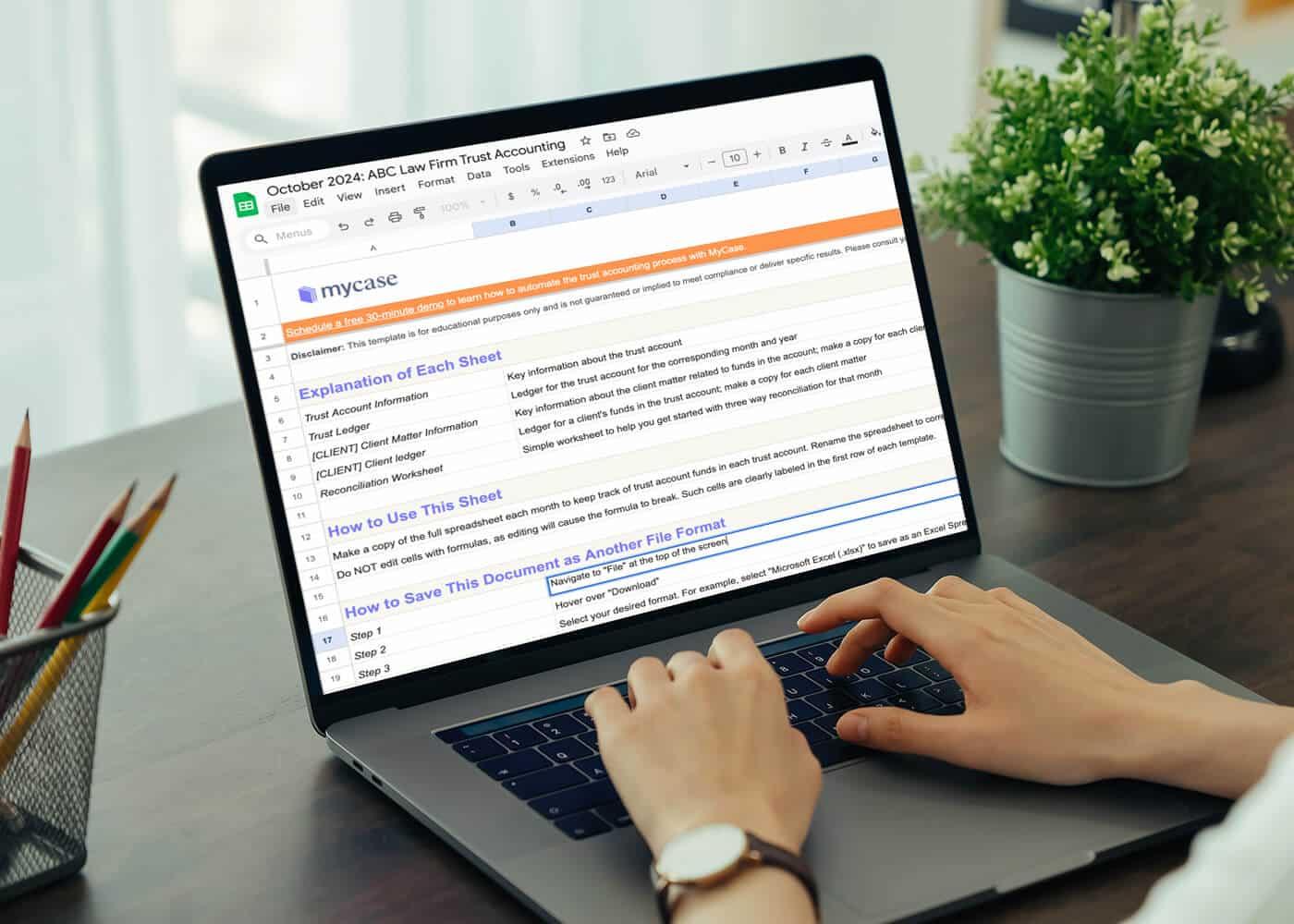 lawyer looking at trust accounting Google Sheets spreadsheet at their desk