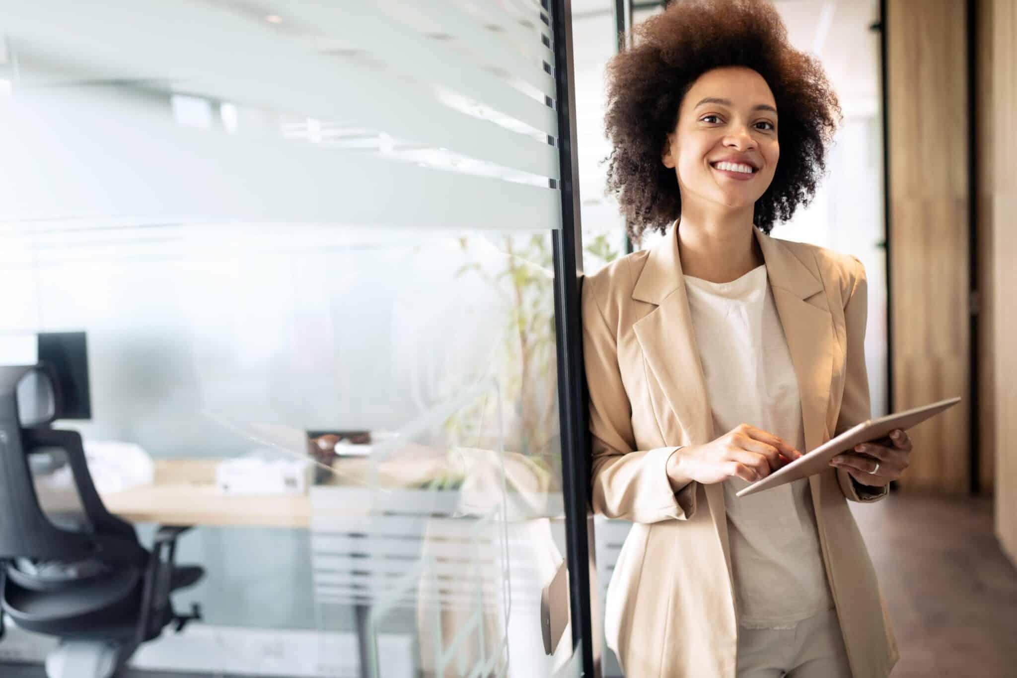 Woman smiling with file