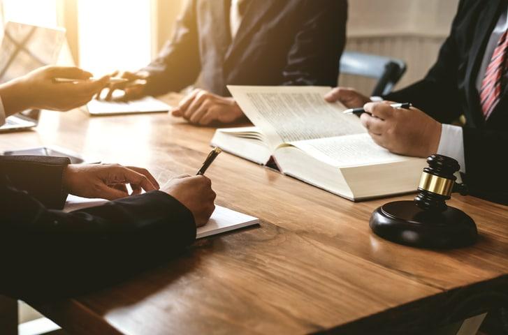 Lawyers studying cases