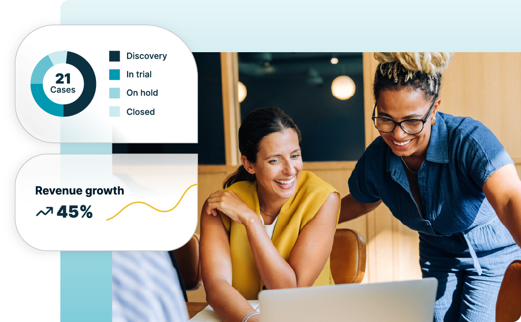 Two lawyers look at a chart of revenue growth