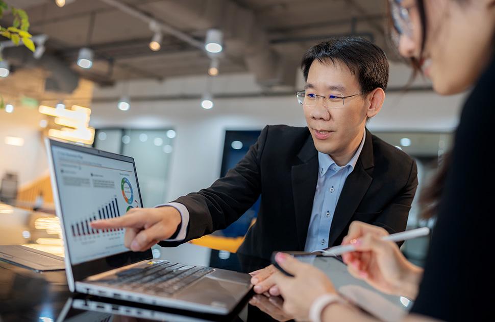 Lawyer looking at financial data on their computer