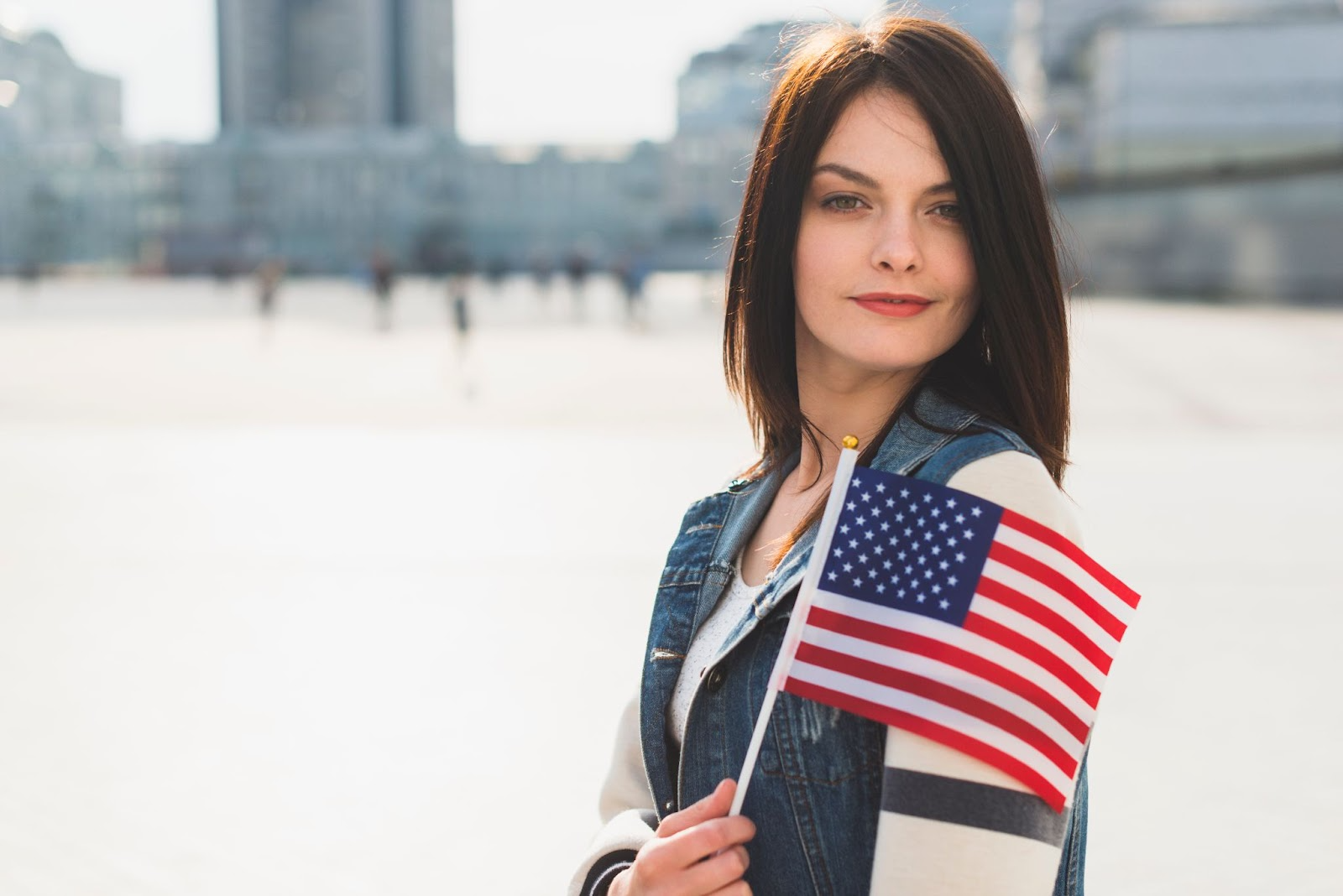 woman holding an american flag