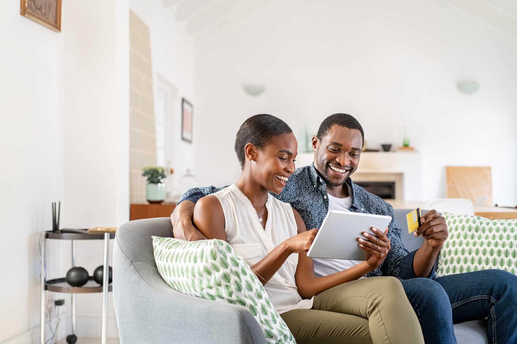 Couple smiling on couch