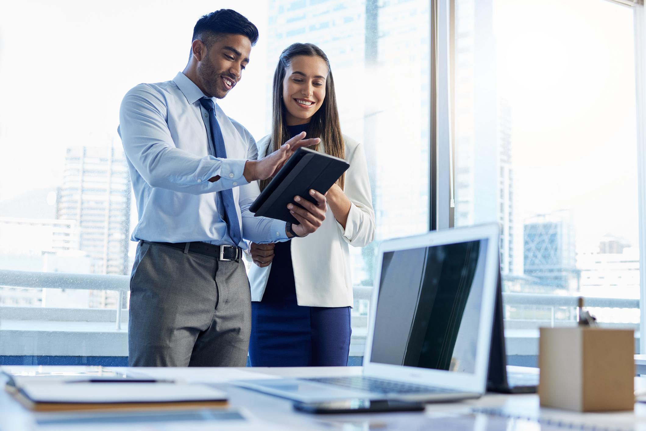 Two employees working together to understand a case