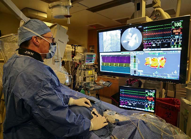 a doctor performs surgery