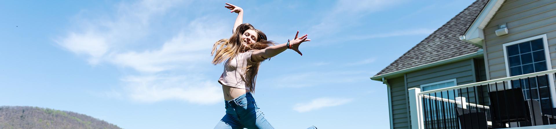 girl jumping in air