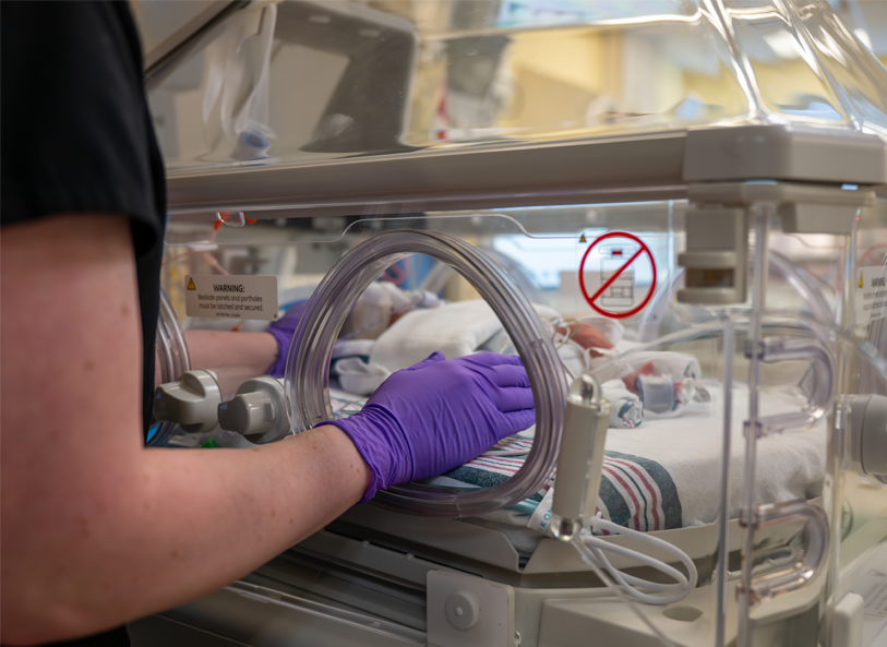 NICU baby in isolette following POLeR procedure