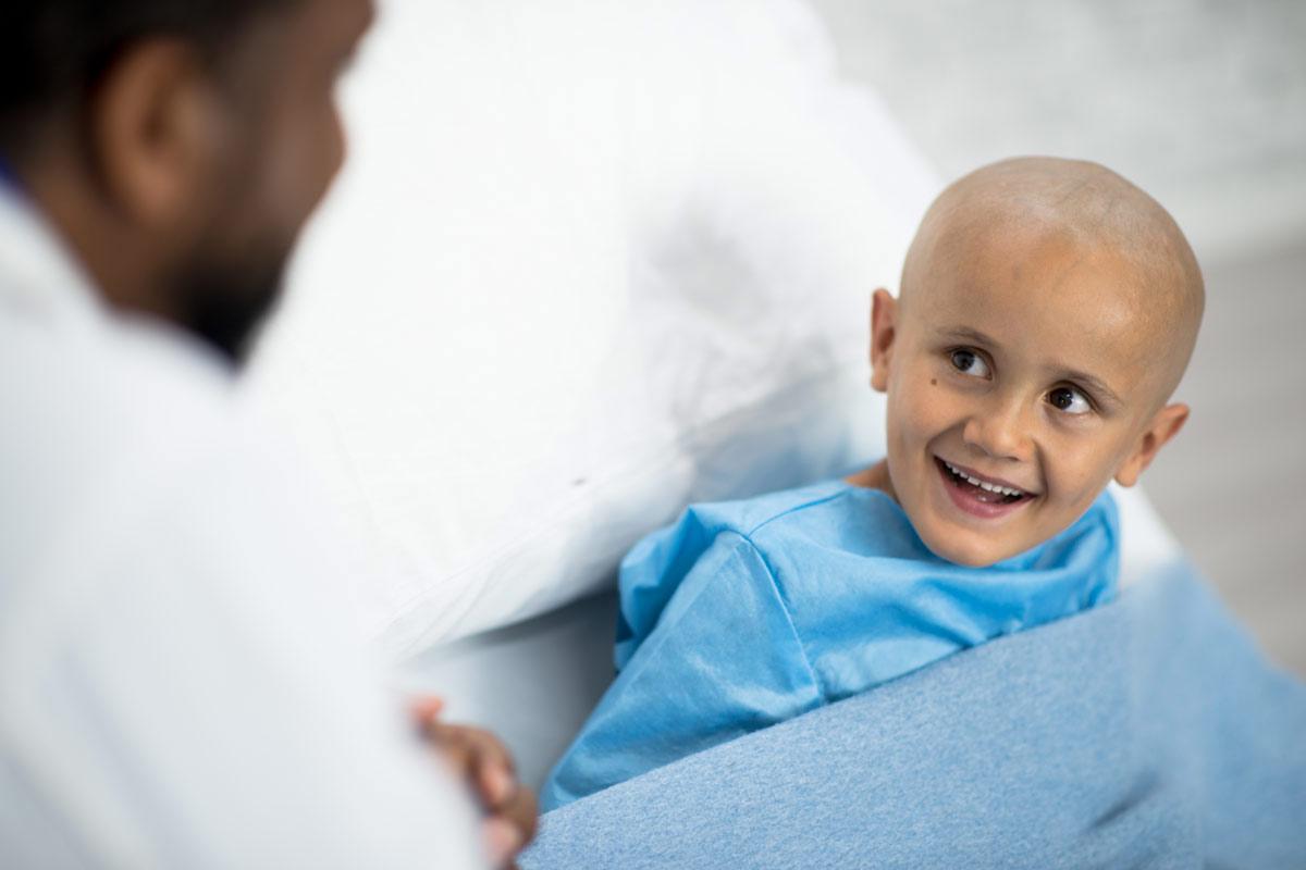 young cancer patient with doctor