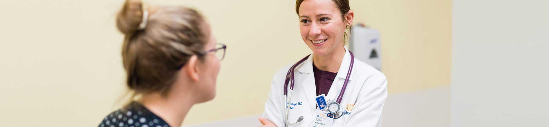 A healthcare provider consulting with an epilepsy patient.