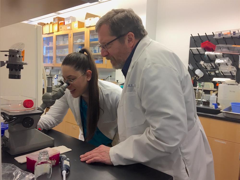 Braciale and Cardani at bench for web