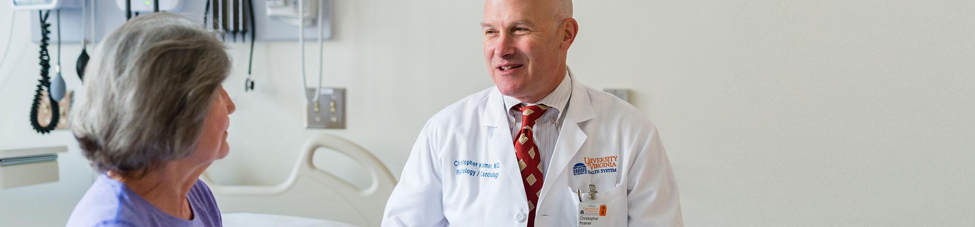 A cardio-oncology healthcare provider consulting with a patient.
