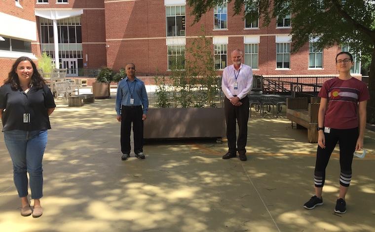 The research team, socially distanced: Mary Young (from left), Mayuresh Abhyankar, Bill Petri and Allie Donlan.