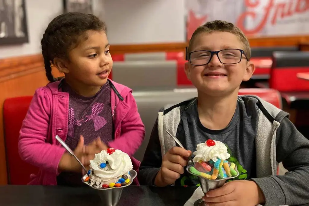 Caydence (left) and Conor enjoy ice cream together. Conor couldn't eat ice cream before his transplant. (Photo courtesy Julia Martin.)
