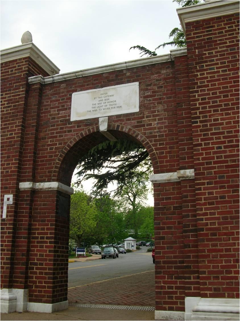 The Arch at Hospital Drive on UVA grounds. The inscription reads, "Enter by this Gateway and Seek the Way of Honor, the Light of Truth, the Will to Work for Men."