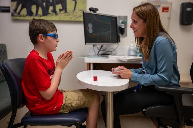 Neuropsychologist working with child who has autism and epilepsy