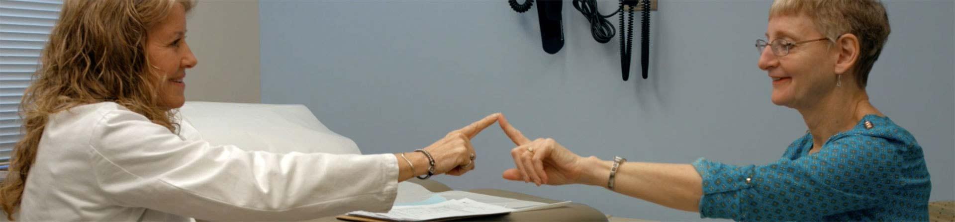 patient and nurse performing movement test