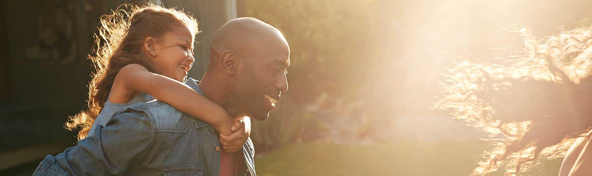 Father and daughter playing in NOVA backyard